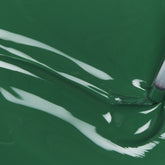 A swatch of the color EMERALD BAE.